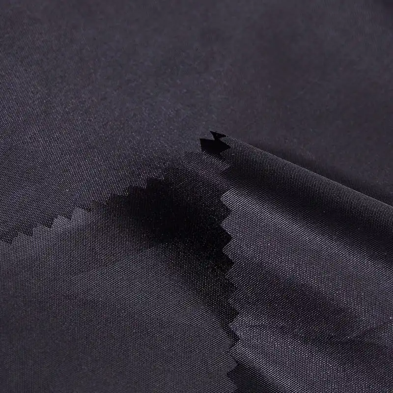 Wie verbessert die PVC -Beschichtung die wasserdichten Eigenschaften von Polyester -Taft? Was ist die wasserdichte Bewertung dieses Stoffes und kann sie mit extremen Wetterbedingungen fertig werden?